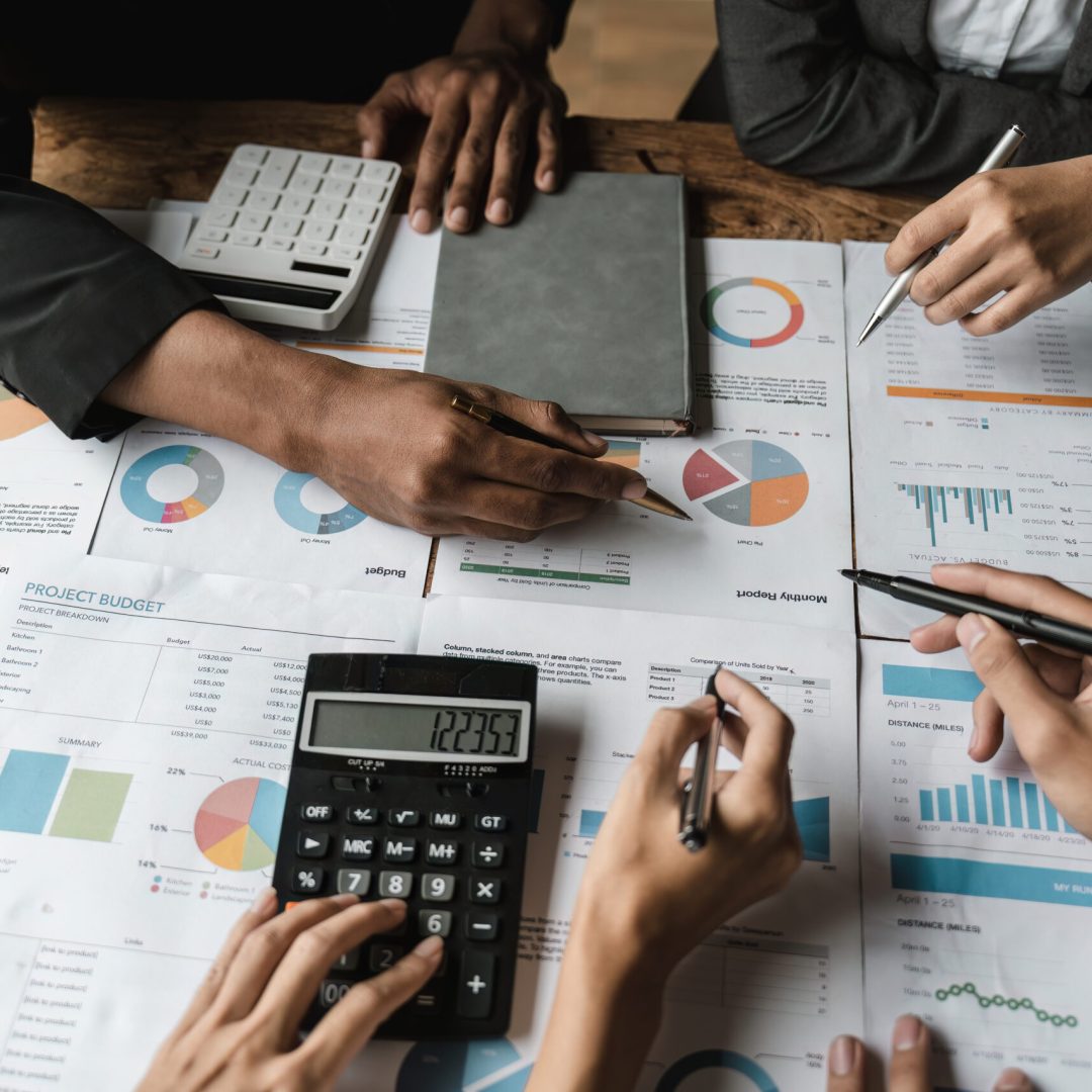 Startup business meeting to analyze and discuss the situation on the financial report in the meeting room. Investment Consultant, Financial advisor and accounting concept.